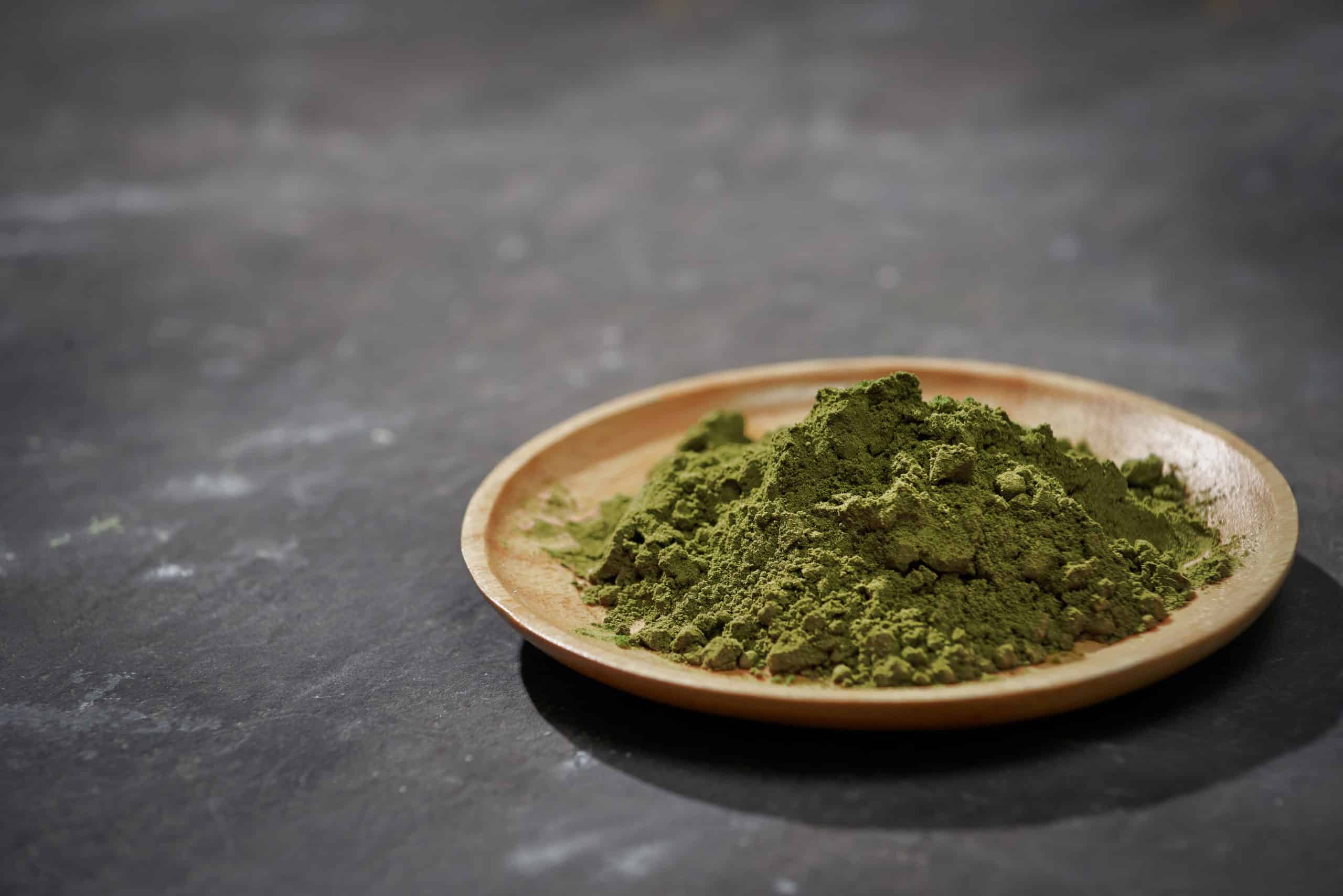 Kratom powder on table